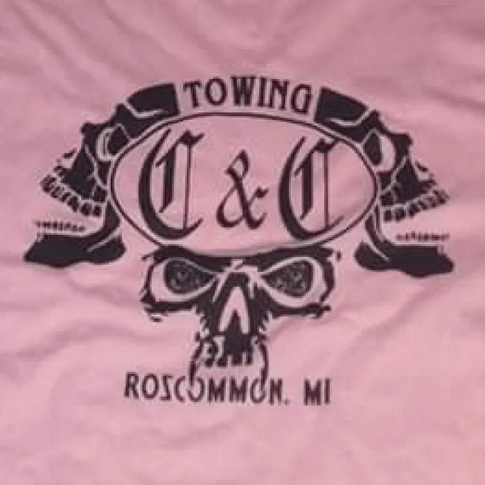 C&C Towing flatbed transporting car in Roscommon County